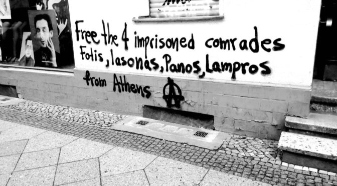 Graffiti slogans in solidarity with the four imprisoned anarchist comrades Fotis, Iasonas, Panos, Lampros (Berlin,Germany)