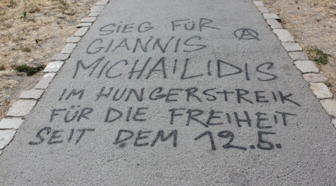 (Berlin) Graffiti, Postering and Banner in solidarity with Giannis Michailidis by Anarchists